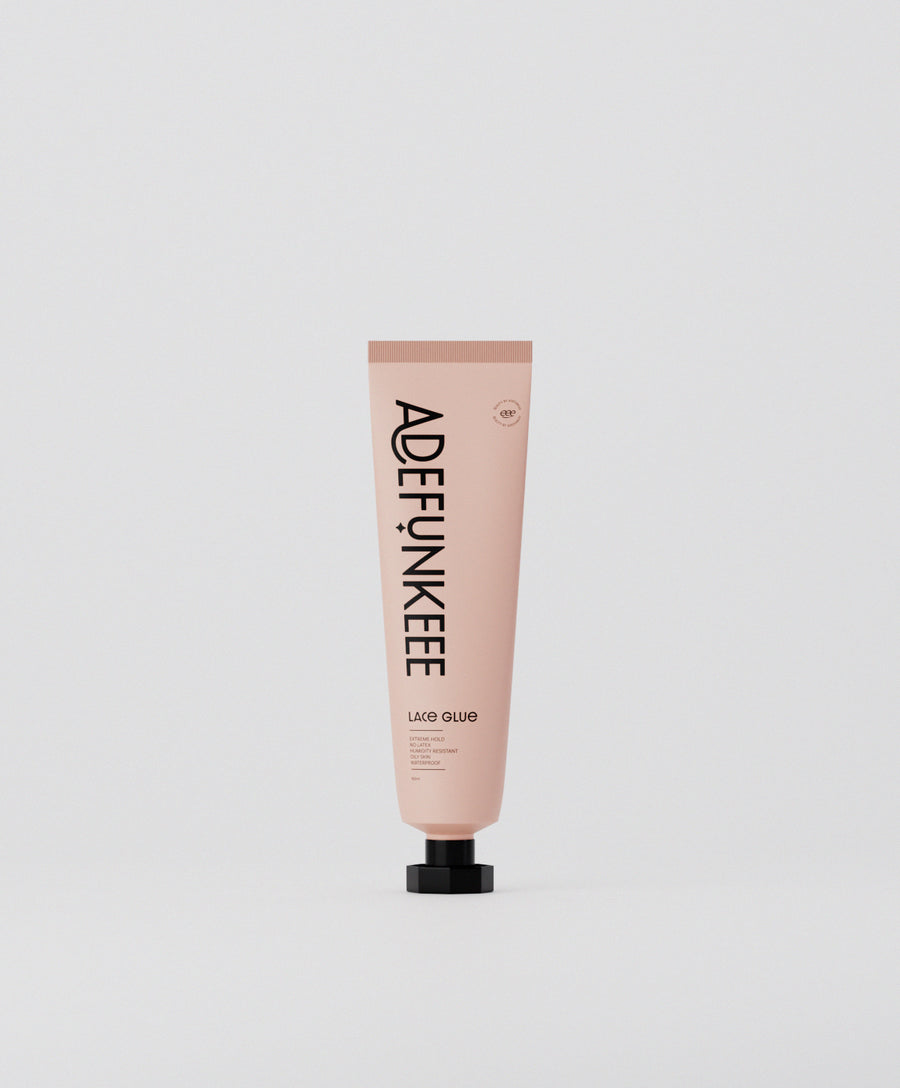 Lace Adhesive Glue in a pink tube