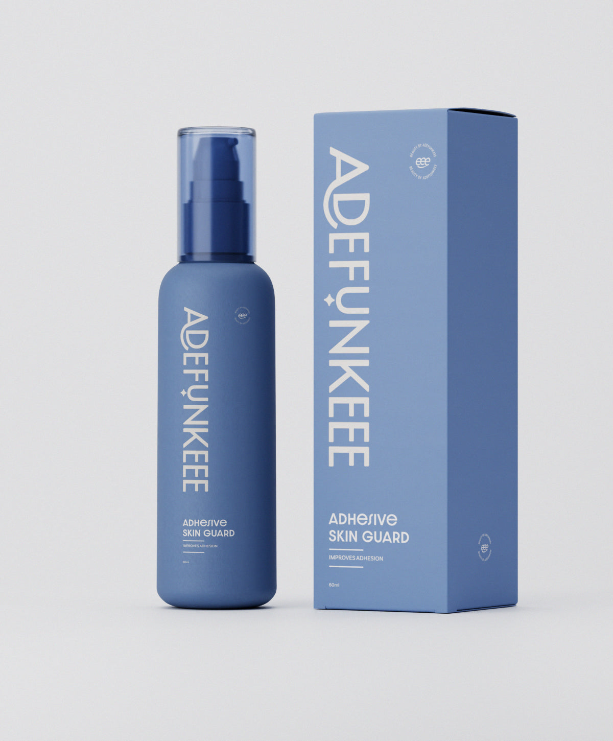 Adhesive Skin Guard bottle beside its box
