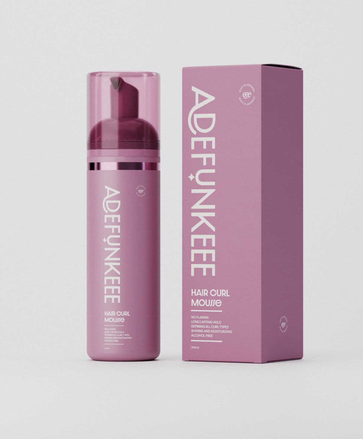 Hair Curl Mousse bottle beside its box
